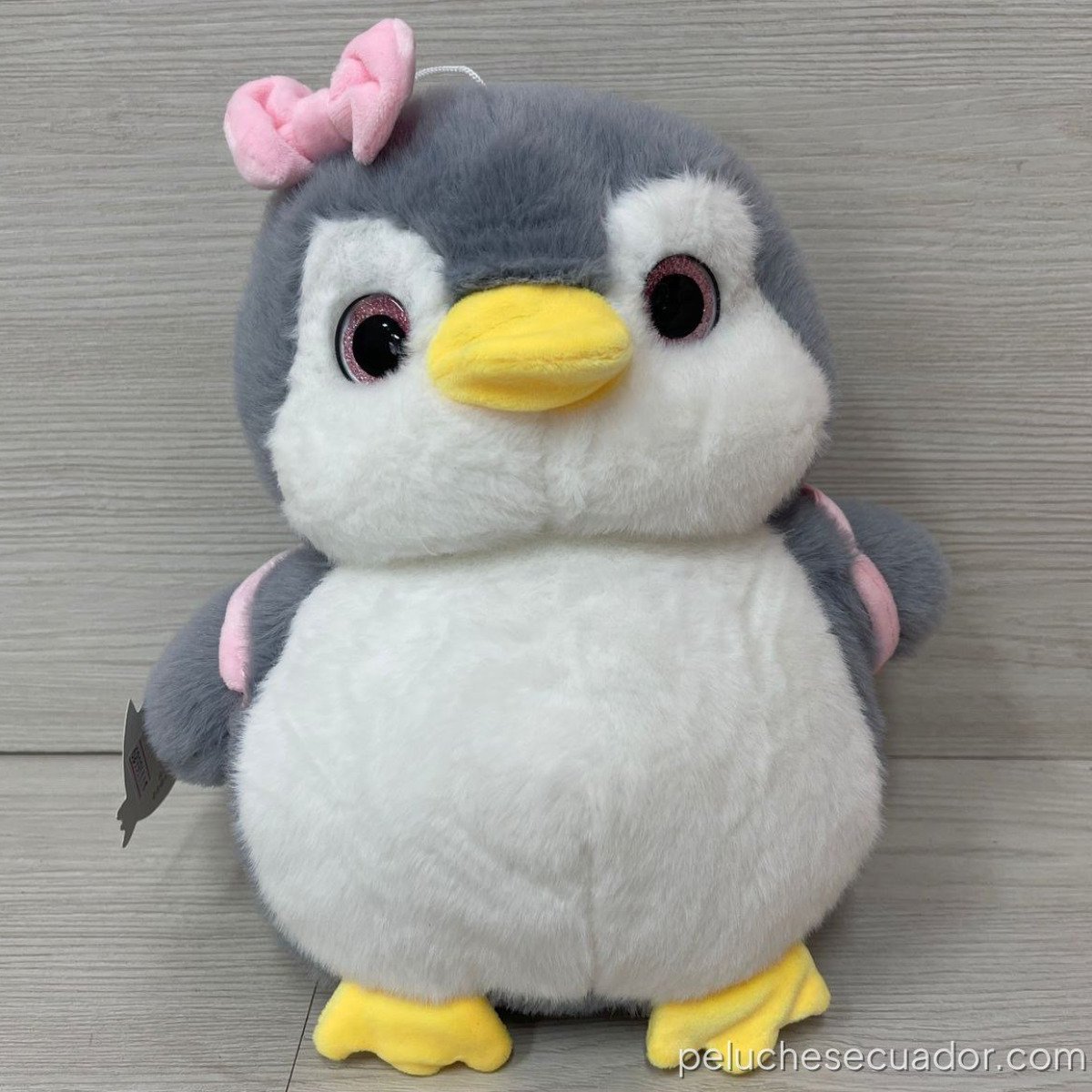 PELUCHE PINGUINO CON BOLSO Y LAZO/CORBATA 30CM IV251521