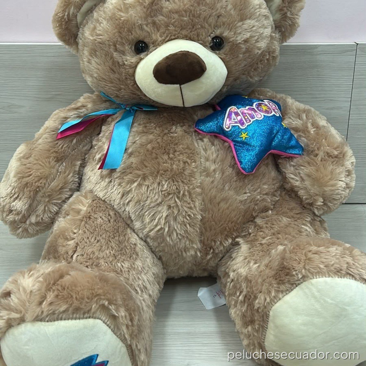 PELUCHE OSO CON LAZO Y ESTRELLA 60CM MCN24-49089 13391R